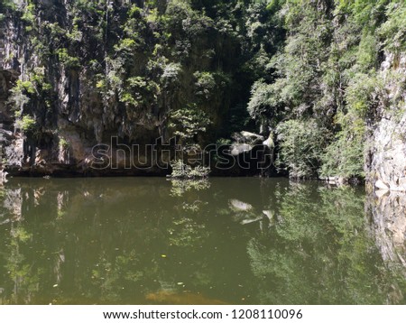 Mirror lake at Ipoh Perak Malaysia is a stunning hidden lakeside surrounded by limestone karst towers 