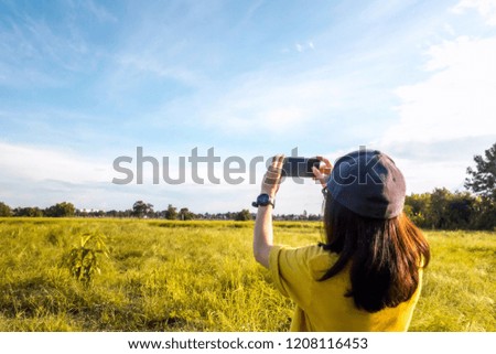 women take photo sky nature and field