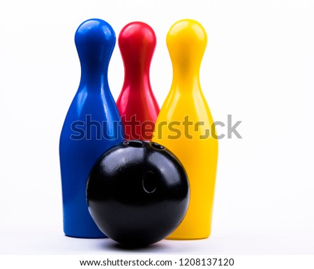 bowling pins and ball play