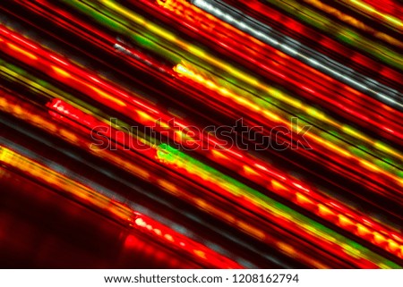 Long exposure light background. Glowing lights in motion. Selective focus