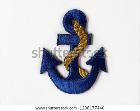 Blue anchor arm patch isolated on white background.Copy space.
