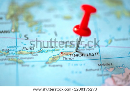 Push pin on the territory of Timor-Leste on the world map