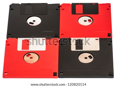 old obsolete colored floppy disks on a white background
