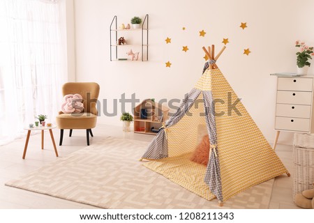 Cozy child's room interior with play tent and toys