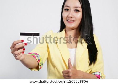 girl with credit card. Business Woman paying with credit card while shopping online.