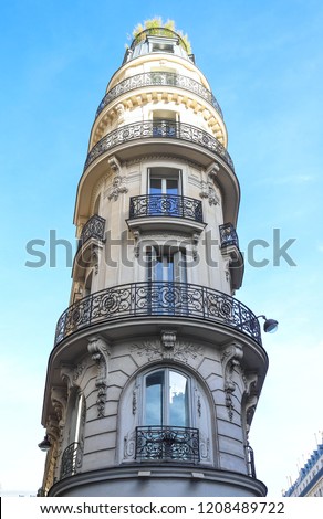 The typical facade of Parisian building, France.