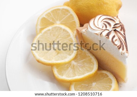 Lemon cheese tart on white background - Soft Focus