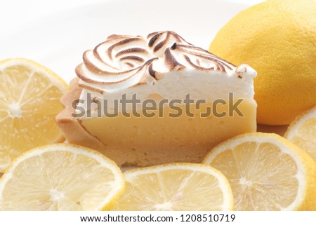 Lemon cheese tart on white background - Soft Focus