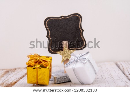 Gift label empty with silver star and presents
