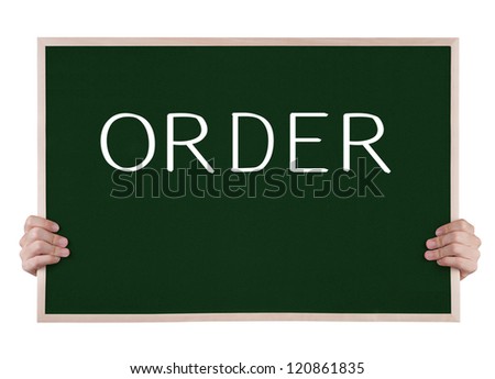order on blackboard with hands