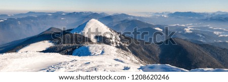 Snow covered winter mountains. Arctic landscape. Colorful outdoor scene, Artistic style post processed photo.