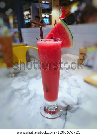 Watermelon Spinning in a tall glass.