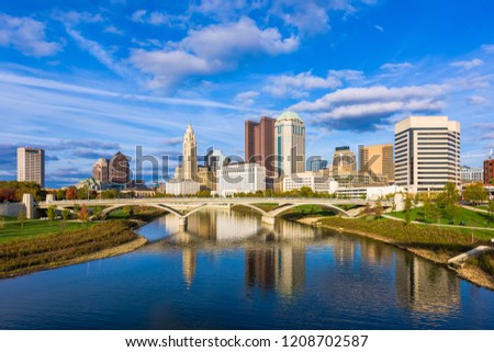 Columbus, Ohio, USA downtown skyline over the Scioto River.