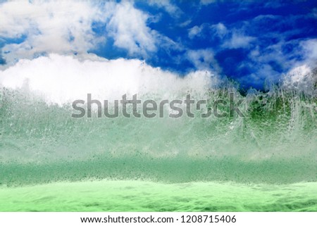 Tropical sea and high wave or surf with Abstract fluffy clouds pattern on blue sky at daylight on summer season background	