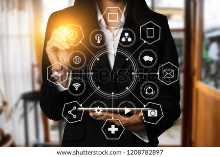 Digital marketing media  in virtual icon globe shape business open his hand, working touch screen tablet front view in morning light.