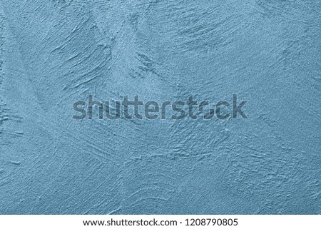 Texture of blue decorative plaster or concrete. Abstract background for design.