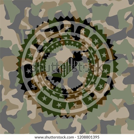 candy icon on camouflaged pattern