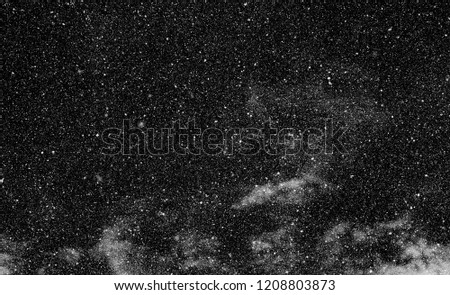 snow, stars, white dots bokeh on black background