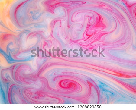 Abstract paint ink, psychedelic background. Colorful spots on water surface.