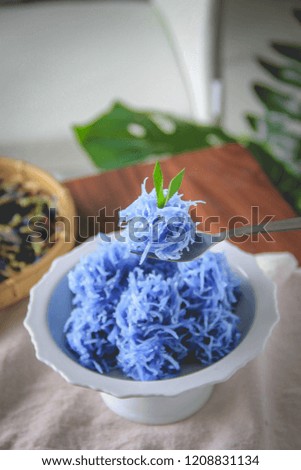 Candied coconut shreds, homemade sweets in Thailand made with coconut flesh cooked in sugar syrup.