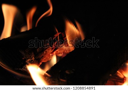 beautiful red fire on black coals, close-up