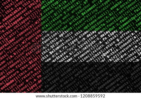 United Arab Emirates flag  is depicted on the screen with the program code. The concept of modern technology and site development