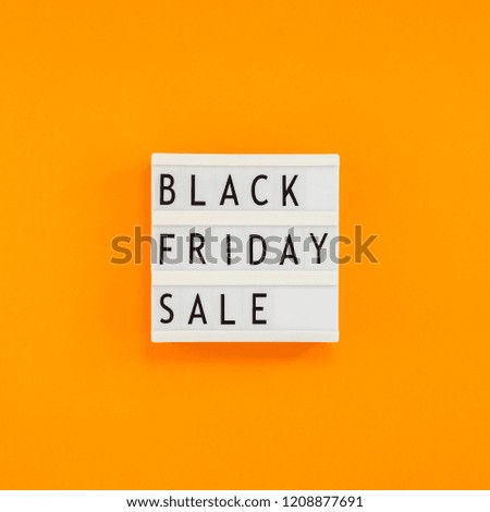 Creative Top view flat lay promotion composition Black friday sale text on white lightbox orange background copy space Square Template Black friday sale mockup fall thanksgiving advertising