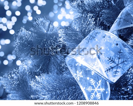 christmas tree new year lights winter background with garland bokeh