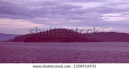 Landscapes of Lake Baikal, the picture was taken in cloudy weather, a cool summer evening.
