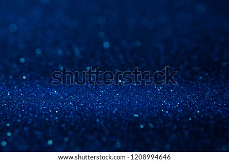 Abstract dark vivid navy blue sparkling glitter wall and floor perspective background studio with blur bokeh.luxury holiday backdrop mock up for display of product.holiday festive greeting card