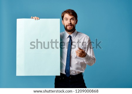 paper sheet in hand and man on blue background mockup, poster                          