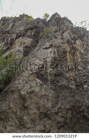 mountain Nature no people strength rock object sky solid day Land outdoors cliff Low angle view challenge formation Royalty-Free Stock Photo #1209013219