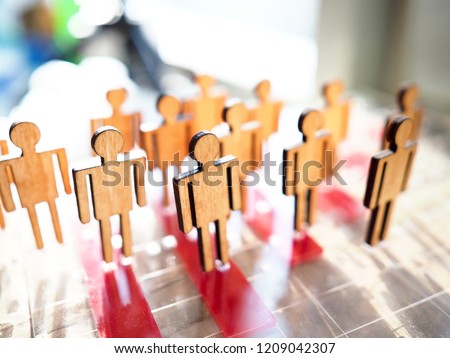 Little wooden toy people figures stand in row closeup. Teambuild hr poll net elector politics crowdfunding relationship labour talent public opinion concept Royalty-Free Stock Photo #1209042307