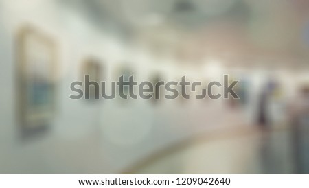 Blurred image, contemporary art gallery or museum or showroom exhibition with blur bright light for abstract business background, modern urban lifestyle