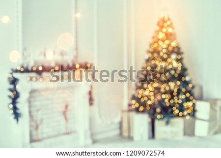 Holiday decorated room with Christmas tree and decoration, backgroound with blurred, sparking, glowing light. Happy New Year and Xmas theme, toning Royalty-Free Stock Photo #1209072574