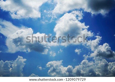 Blue sky with cloud. Clearing day and Good weather in the morning. Sunset with sun rays, sky with clouds and sun.Plain landscape background for summer.                                    