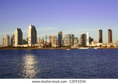 Downtown of San Diego, Ca, skyline, sailing, clear evening.