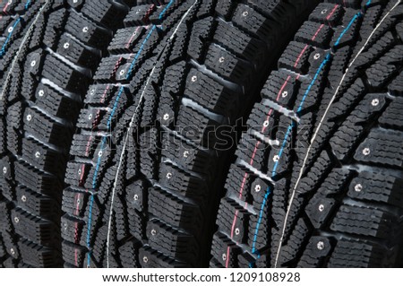 Automotive studded tires closeup.
