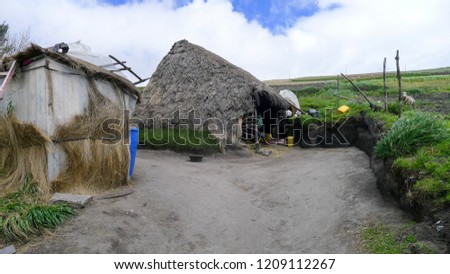 Traditional ecuatorian highland farm with wooden houses on the road nr 30 from Latacunga to quilotoa.