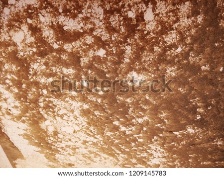 The Grunge of the Concrete surface. The Depiction of weather system seen from the satellite view. Abstract background of Brown, Black and White color. 