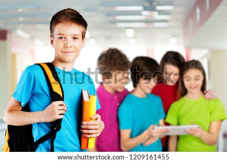 School boy with books and backpack Royalty-Free Stock Photo #1209161455