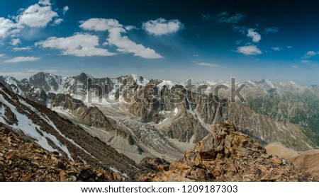 Panorama of mountains in Kyrgyzstan, Tian Shan mountains, photo from the top of the Pik Uchitel (4545m) - Ala Archa National Park