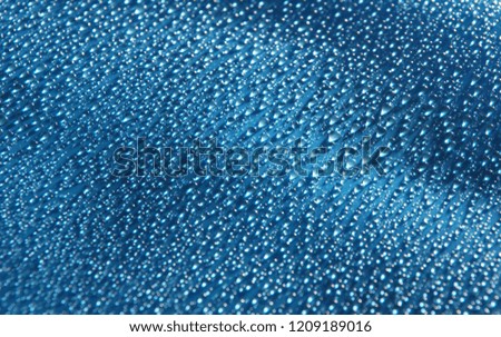 water drops abstract blue background close up