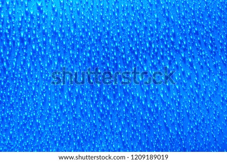 water drops abstract blue background close up