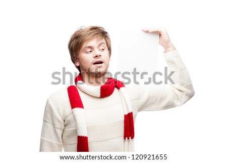 portrait of young cheerful caucasian man which holding sign on shoulder with funny expression