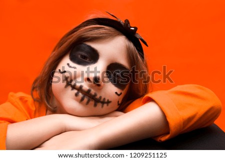 Halloween. Girl in a witch costume