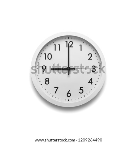 White wall clock isolated on white background. On the clock, nine on the clock. Royalty-Free Stock Photo #1209264490
