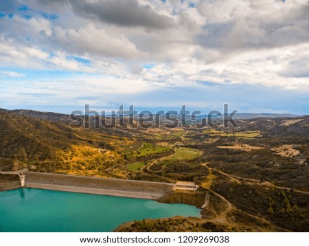 Aerial shot of water power plant, dam and reservoir in Cyprus. Winter