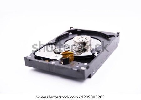 Storage device, hard drive with the lid open on a white background, Closeup