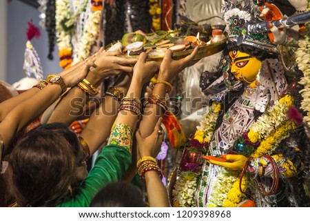 Award winning community puja commite gather with their Durga Idols and participant to take part in  carnival in Kolkata.